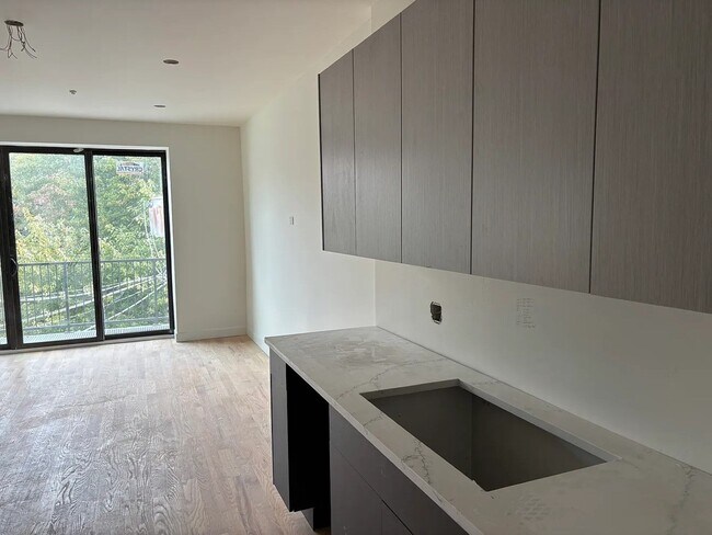Building Photo - Brand new construction boutique elevator b...