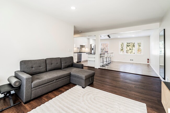 Living room view to dining room and open concept kitchen - 253 Short Hills Ave