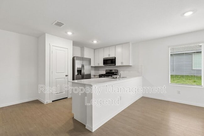 Building Photo - 216 Asterwood Ln