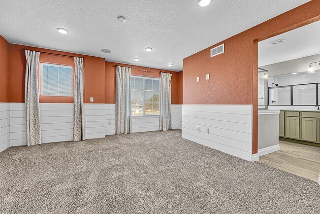 Building Photo - Former Model Home - Superb townhome in great location!