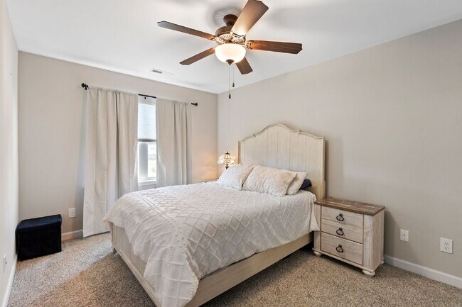 Building Photo - Available Now! Enjoy low-maintenance coastal living in this beautiful 2-bedroom, 2.5-bath townhom...