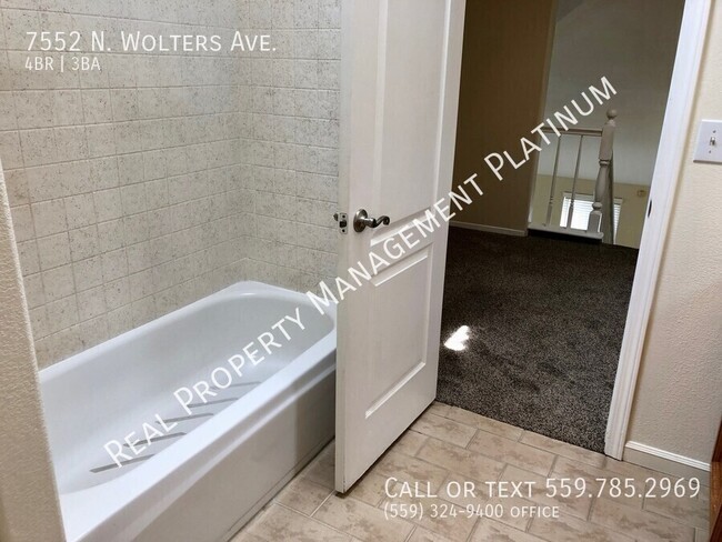 Building Photo - 7552 N Wolters Ave