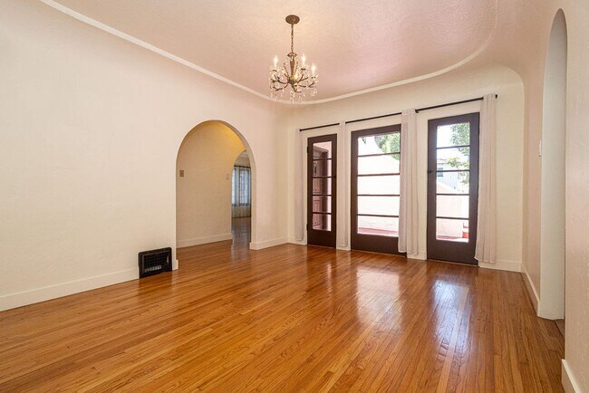 Building Photo - Beautifully Restored 3BR Miracle Mile Duplex | 1,725 SF | Near Metro D Line