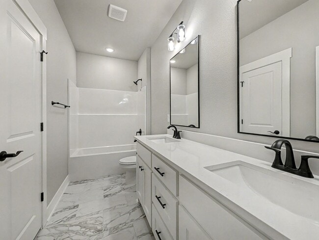 Building Photo - Tucked Into A Prime Spot In Bella Vista Wi...