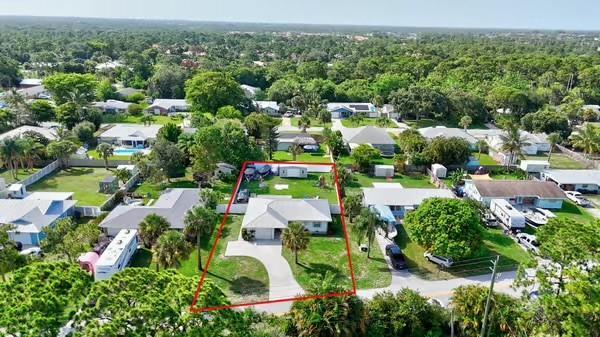 Building Photo - 6159 SE Poinciana Ln
