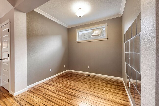 Building Photo - Custom-Built 4BR/2.5BA Two-Story Near Woodstock — Quartz Island Kitchen, Gas Fireplace & Fenced Y...