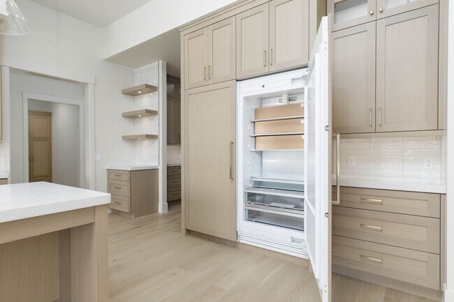 Building Photo - Gorgeous Custom Single Story with RV Garage