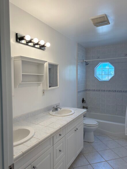 Building Photo - 7939 Denrock Ave