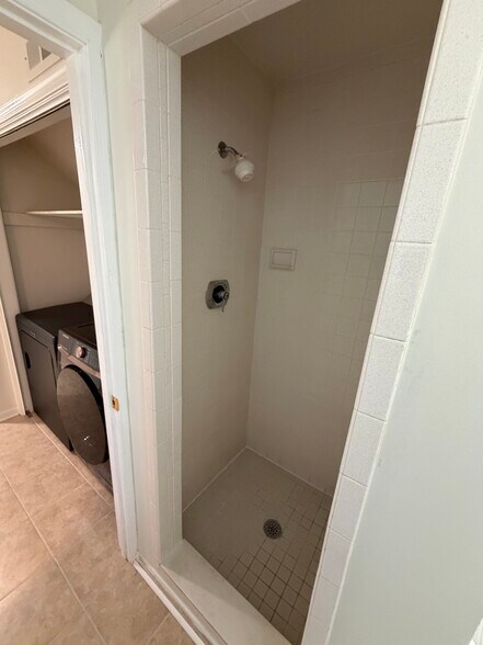 Tile shower in second bathroom - 104 E Poplar St