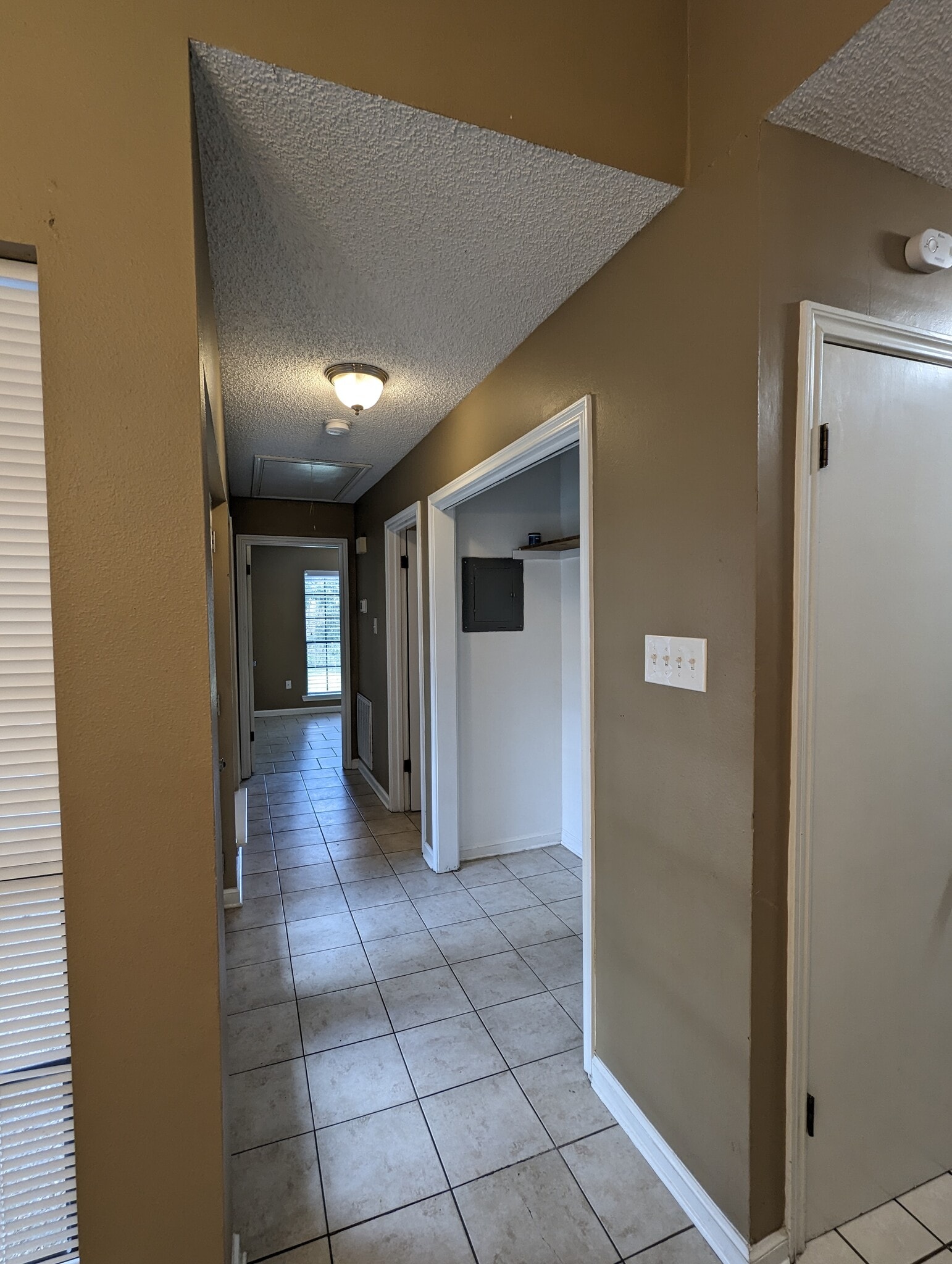 Washer and Dryer Hookup and Hall leading to 2 Bedrooms - 1143 Willow Creek Dr