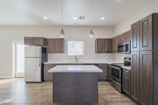 Kitchen with stainless steel appliances - Citrus on 37th Street