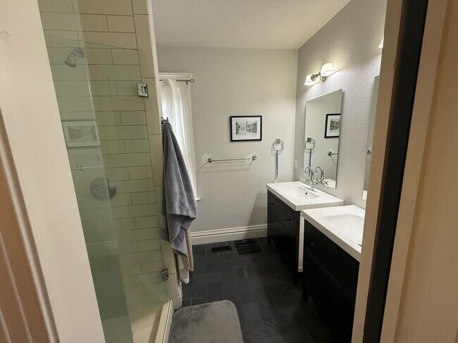 Building Photo - Remodeled 2 Bed / 2 Bath ½ Townhome | Private Rooftop Patio + Detached Garage |  Available Early ...