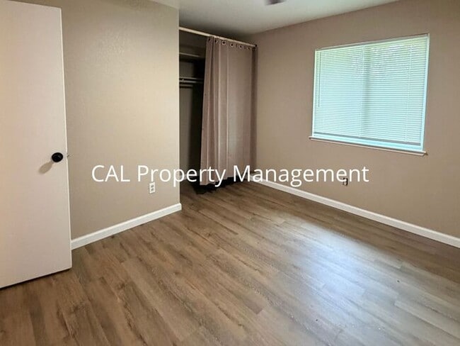 Building Photo - Spacious 4-Bedroom Home with 2-Car Garage & Backyard Oasis