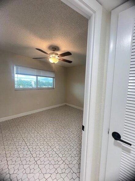 Building Photo - 8515 Sunrise Lakes Blvd