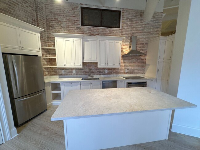 Building Photo - Iconic Kress Building 2BR Condo with Parking & Sound Panels