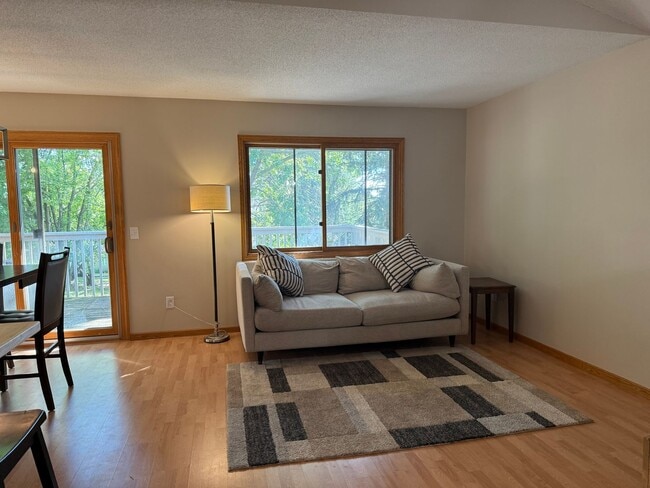 Building Photo - Two Bedroom Townhouse W/ Views Of Rice Lak...