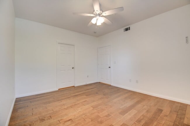 Building Photo - Gated, beautiful, and safe in a secure community