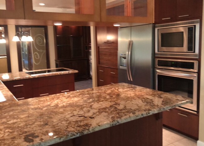 Custom kitchen with cherry and maple cabinets/pull out drawers, granite & stainless steel - 5930 Long Acres Ct
