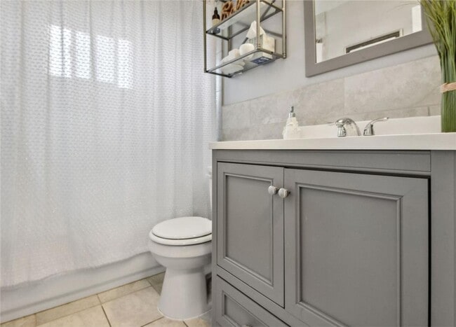 Building Photo - Updated Brick Ranch with Gorgeous Finishes...