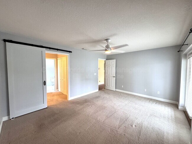 Building Photo - 4818 Breezy Palms Ct