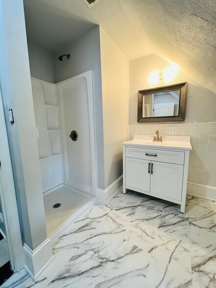 Newly renovated bathroom - 304 Cedar Lake Rd S