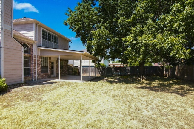 Building Photo - "Spacious Two-Story Home with Multiple Living Spaces and and Expansive Backyard!"