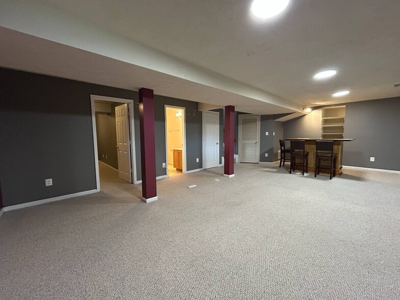 Basement living - Den Full Bath - 5556 Village Center Dr