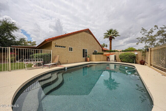 Building Photo - 9085 E Windrose Dr