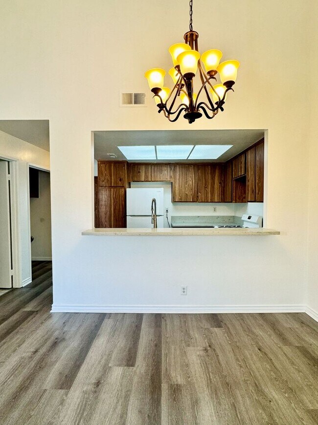 Building Photo - RENT SPECIAL!! $500 OFF SECOND MONTH RENT - Spacious 3 Bedroom 2 Bath Condo in Hawaiian Gardens