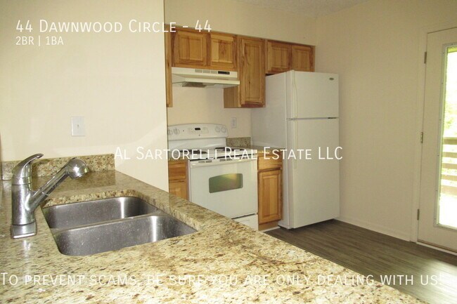 Building Photo - Pet Friendly Condo close to town and ready...