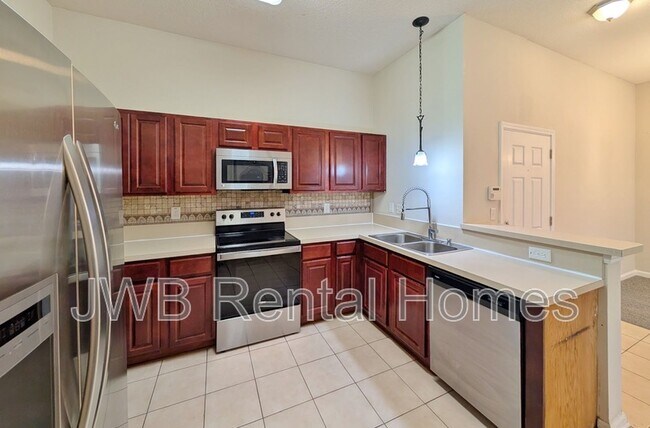 Building Photo - 5050 Playpen Dr