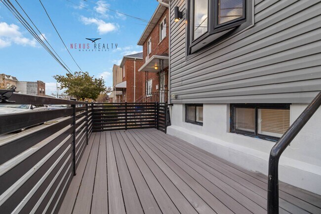 Building Photo - 21-28-28 48th St