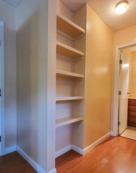Master bedroom shelves - 6519 W Newberry Rd