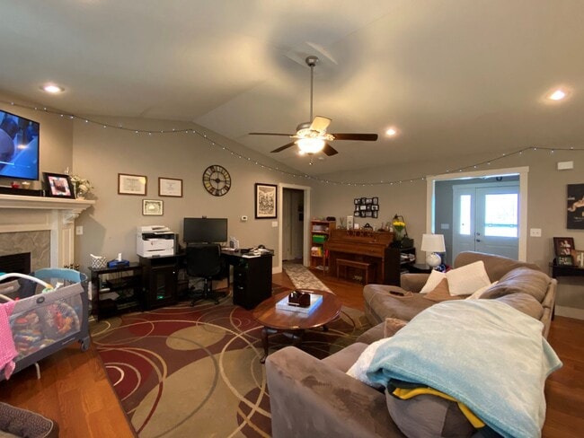 Building Photo - FENCED BACKYARD! BONUS ROOM/OFFICE! SAFE ROOM! THREE CAR GARAGE