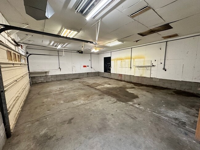 Building Photo - Every Man's Dream... Nice Home with Huge Heated Garage