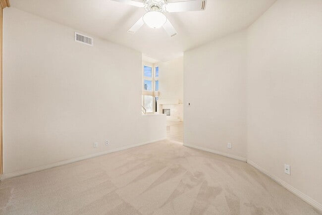 Building Photo - Charming Guard-Gated Southwest Las Vegas Townhome with Fireplace & Golf Course Views!