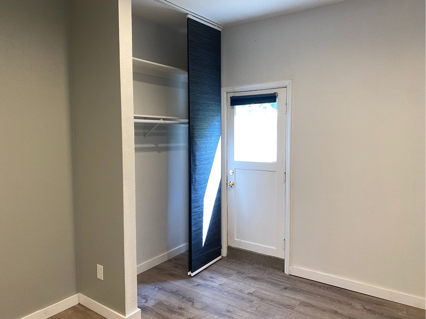 Closet with shelves, door to garden patio - 136 Farallon Dr