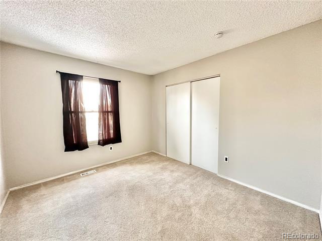 Building Photo - 1852 E 99th Ave