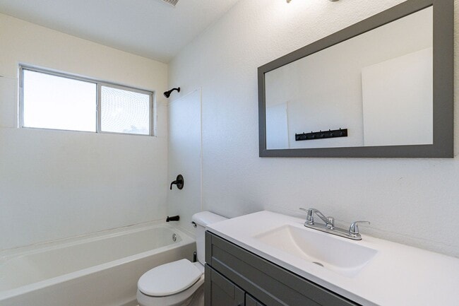 Building Photo - Spacious 5-Bedroom Home with Open Layout & Private Backyard