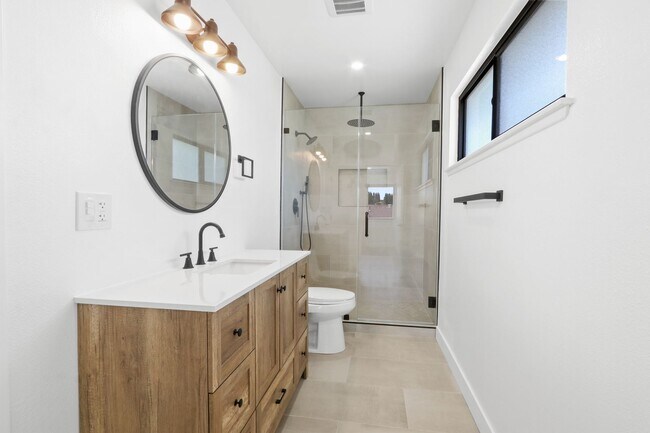 Building Photo - Renovated Lake Forest Home with Expansive Yard & Modern Finishes