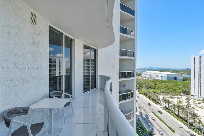 Building Photo - 15811 Collins Ave