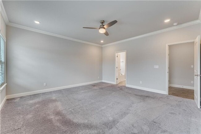 Building Photo - Minutes from I-49! 4BR/2.5BA Home
