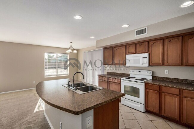 Building Photo - 5215 W Hasan Dr