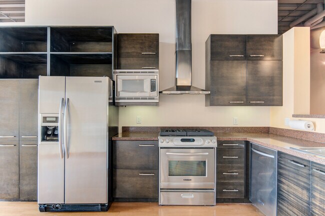 Building Photo - Luxury Gold Lofts! Bright Open Floor Plan with City Views-Secure Parking