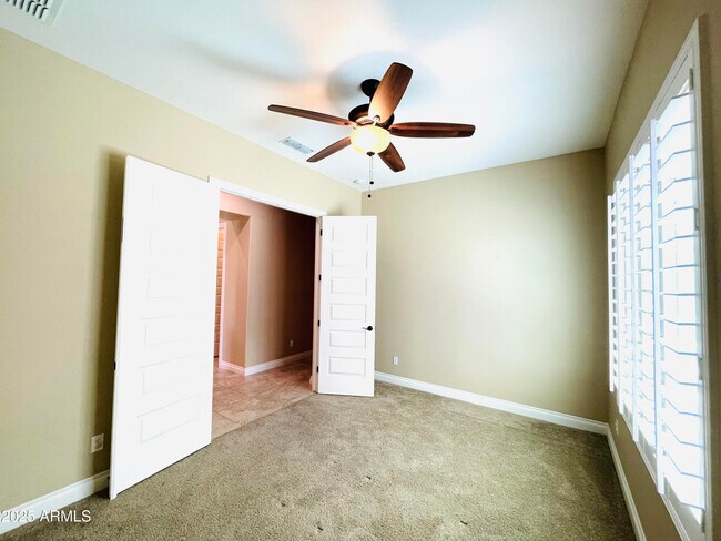 Building Photo - 3104 E Wildhorse Ct