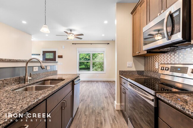 Building Photo - Modern Three-Bedroom Home with Screened Po...