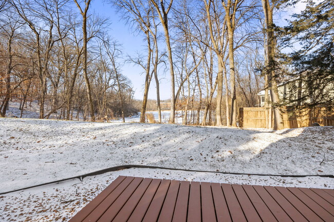 Backyard deck off walkout lower level - 17800 Frommes Cir