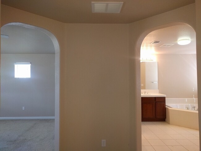 Building Photo - Gated Community Stunner ready to be called home