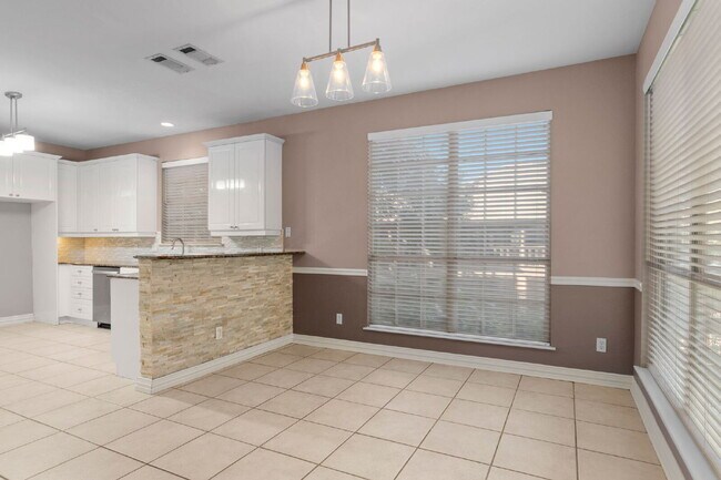 Building Photo - "Beautiful 4-Bedroom Home with Expansive Deck and Spacious Living Areas!"