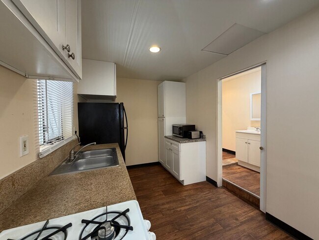 Building Photo - READY TO MOVE IN- MUST SEE - TWO CAR OFF STREET PARKING SPOTS AND UTILITIES PAID